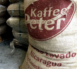 Green coffee in jute bag for Kaffee-Peter